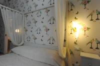 Łóżko lub łóżka w pokoju w obiekcie Palazzo Scura