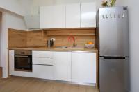 Kuchyň nebo kuchyňský kout v ubytování Apartmani Marta