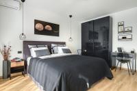 Łóżko lub łóżka w pokoju w obiekcie Giardini Penthouse apartment Pula