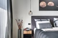 Łóżko lub łóżka w pokoju w obiekcie Giardini Penthouse apartment Pula
