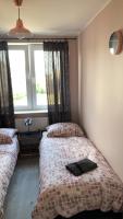 Postel nebo postele na pokoji v ubytování Apartament Mia
