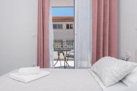 Posteľ alebo postele v izbe v ubytovaní Apartments PETRUSIC