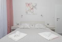 Posteľ alebo postele v izbe v ubytovaní Apartments PETRUSIC