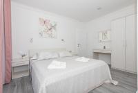 Posteľ alebo postele v izbe v ubytovaní Apartments PETRUSIC