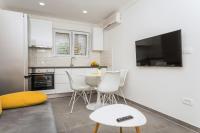 Kuchyňa alebo kuchynka v ubytovaní Apartments PETRUSIC