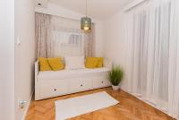 Posteľ alebo postele v izbe v ubytovaní Apartmani Julija