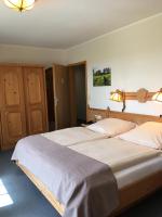 Postel nebo postele na pokoji v ubytování Flair Landhotel Strengliner Mühle