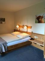 Postel nebo postele na pokoji v ubytování Flair Landhotel Strengliner Mühle
