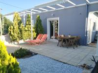 Patio alebo iná vonkajšia časť ubytovania Manos Housing Units