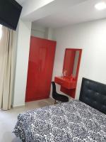 Postel nebo postele na pokoji v ubytování M & M Red Luxury