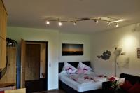 Łóżko lub łóżka w pokoju w obiekcie Appartement Spath
