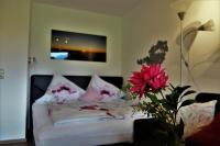 Łóżko lub łóżka w pokoju w obiekcie Appartement Spath