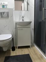 Kúpeľňa v ubytovaní Apartamenty "NaLetniej" Przy Morzu