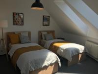 A bed or beds in a room at Mymara 19