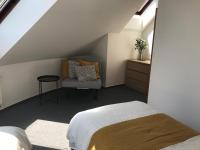 A bed or beds in a room at Mymara 19