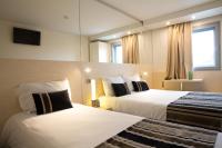 Park Hotel Porto Gaiaにあるベッド