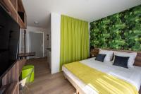 ATHOME RESIDENCE ET SPAにあるベッド