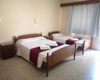 Postel nebo postele na pokoji v ubytování Minaides Hotel