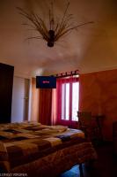 Posteľ alebo postele v izbe v ubytovaní B&B al centro storico