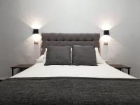 Posteľ alebo postele v izbe v ubytovaní Hostal Cuzco