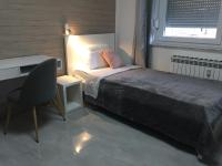 Posteľ alebo postele v izbe v ubytovaní Apartman SONAS 2 with free private parking