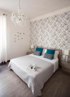 Posteľ alebo postele v izbe v ubytovaní Nobilcasa Suites