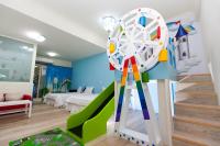 a childrens room with a play room with a roller coaster at Hualien Lidu House in Hualien City