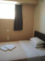 Postel nebo postele na pokoji v ubytování Pella Inn Hostel