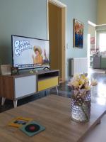 A television and/or entertainment centre at Avgi Garden House Chania with private entrance