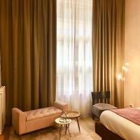 Postel nebo postele na pokoji v ubytování INTOMILAN Galleria Duomo I Boutique & Design Aparthotel