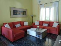 A seating area at Avgi Garden House Chania with private entrance