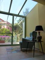 A seating area at Avgi Garden House Chania with private entrance