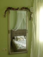 A bed or beds in a room at Avgi Garden House Chania with private entrance