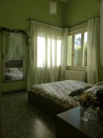 A bed or beds in a room at Avgi Garden House Chania with private entrance