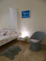 A bed or beds in a room at Avgi Garden House Chania with private entrance