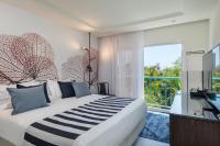 Ein Bett oder Betten in einem Zimmer der Unterkunft Yam Suf by Isrotel Collection