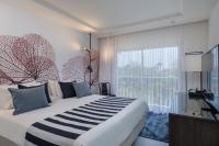 Ein Bett oder Betten in einem Zimmer der Unterkunft Yam Suf by Isrotel Collection