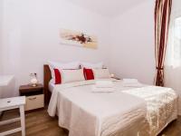 Postel nebo postele na pokoji v ubytování Apartment Villa Nikaroni-2 by Interhome