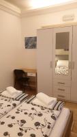 Posteľ alebo postele v izbe v ubytovaní Apartmani N.May's