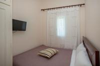 A bed or beds in a room at Xατζηράδος