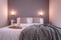 Cama o camas de una habitación en CANDIL SUITE Origen