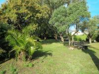 a park with a picnic table and trees and grass at Holiday Home Les Chênes - MAA200 by Interhome in Borgo