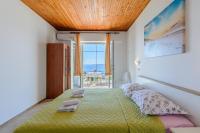 Posteľ alebo postele v izbe v ubytovaní Rooms Sani