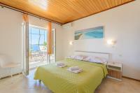Posteľ alebo postele v izbe v ubytovaní Rooms Sani