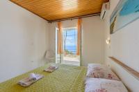 Posteľ alebo postele v izbe v ubytovaní Rooms Sani