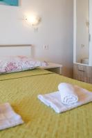 Posteľ alebo postele v izbe v ubytovaní Rooms Sani