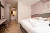 Posteľ alebo postele v izbe v ubytovaní Deluxe apartments & rooms Revis