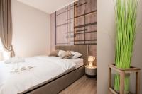 Posteľ alebo postele v izbe v ubytovaní Deluxe apartments & rooms Revis