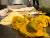 a pile of yellow peppers on a counter with flour at Albergo Locanda Primavera in Rodengo Saiano