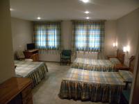Postel nebo postele na pokoji v ubytování Hotel Duque de Calabria